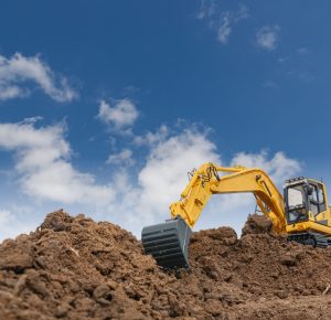 Excavator,With,Bucket,Lift,Up,Are,Digging,Soil,In,The